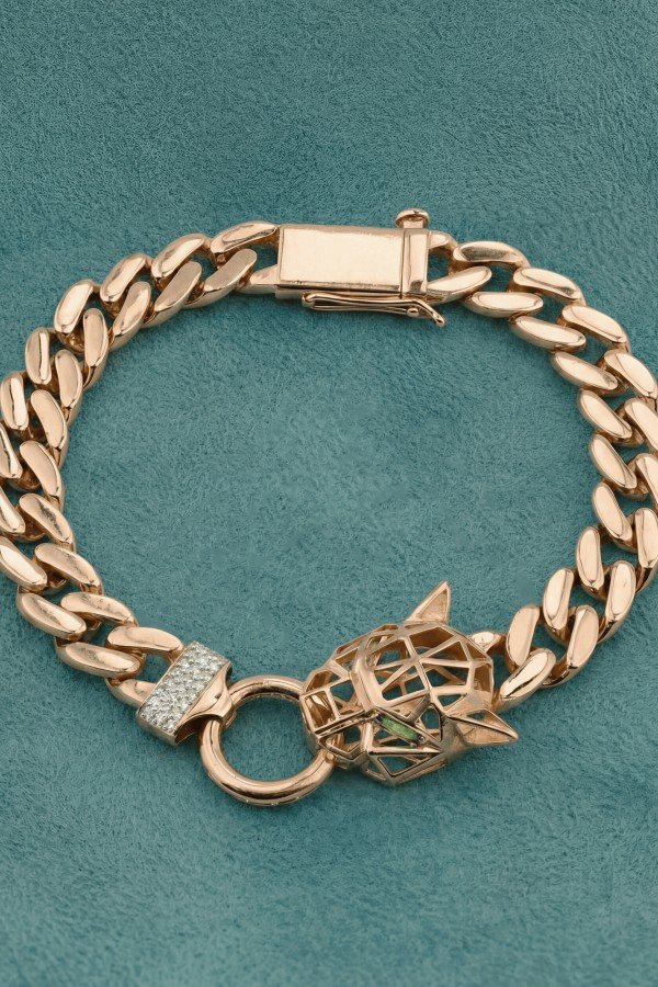 Браслет из золота c бриллиантами и изумрудом