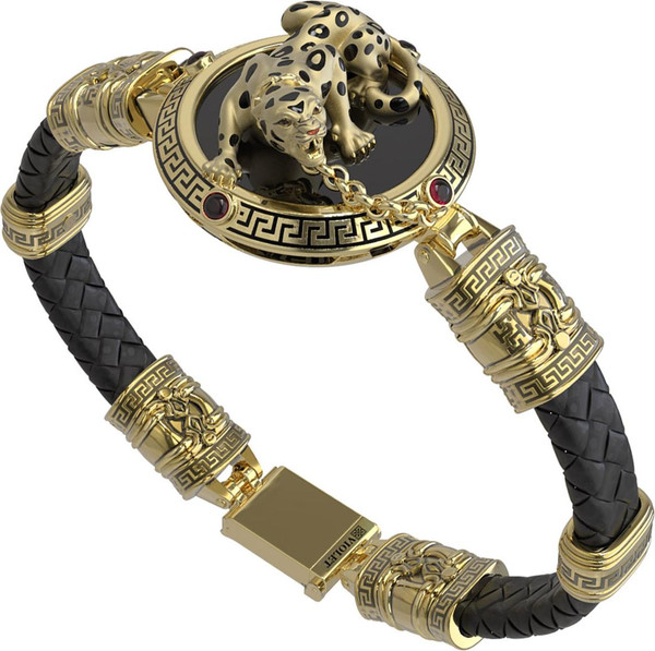 Браслет из лимонного золота c эмаль , шнурком, ониксом и рубином