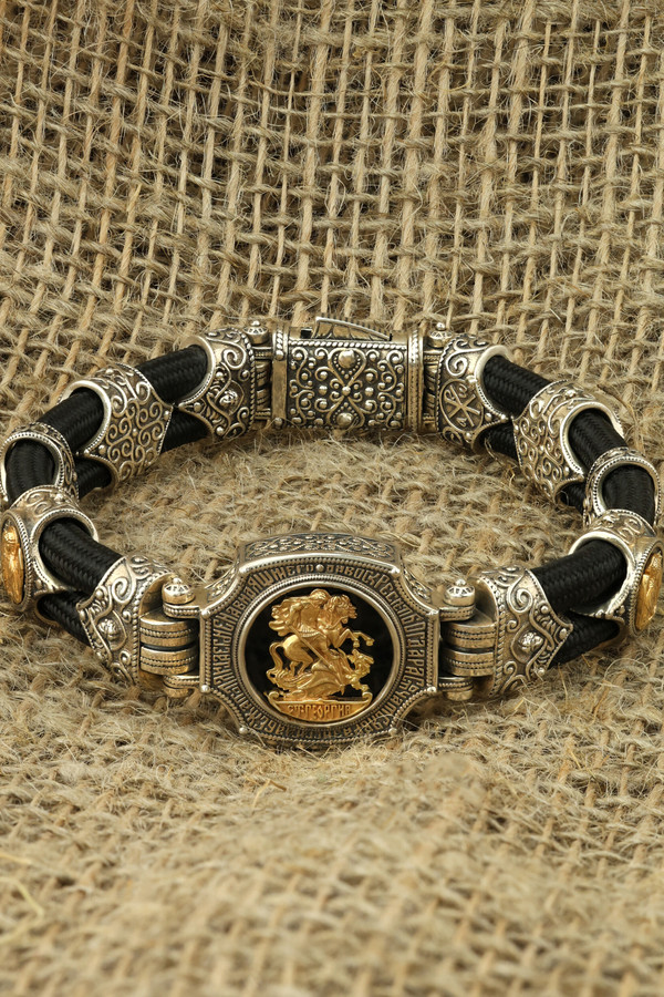 Браслет из серебра и золота c ониксом и шёлковым шнурком